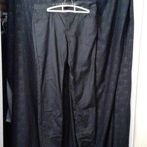 Faux-leather; coated black skinny jeans